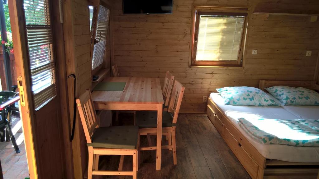 Postel nebo postele na pokoji v ubytování Chata Nový Přerov