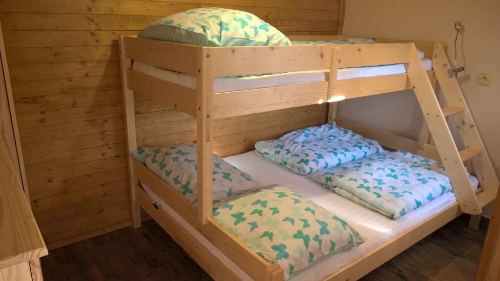 Postel nebo postele na pokoji v ubytování Chata Nový Přerov