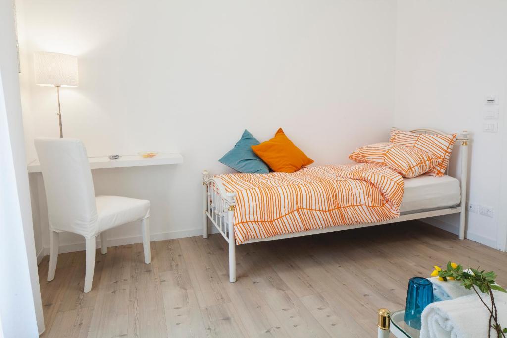Postel nebo postele na pokoji v ubytování Artemide Relais