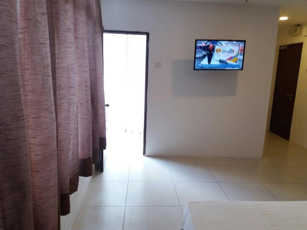TV a/nebo společenská místnost v ubytování T-Hotel Ipoh