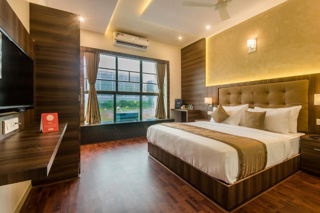 Ένα ή περισσότερα κρεβάτια σε δωμάτιο στο Hotel BKC Inn - Near Trade Center, Visa Consulate BKC