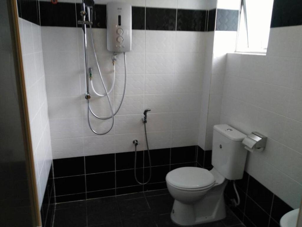 Koupelna v ubytování T-Hotel Ipoh