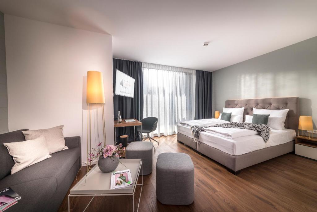 Postel nebo postele na pokoji v ubytování Hotel Melchior Park