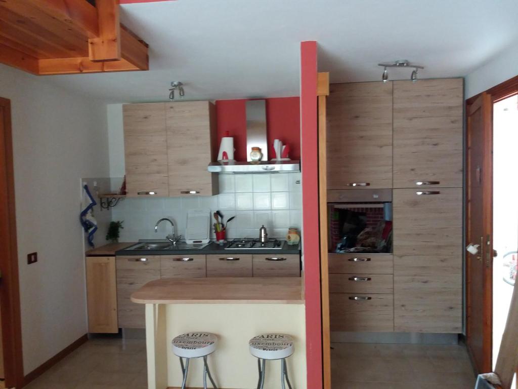 Kuchyň nebo kuchyňský kout v ubytování I Ginepri