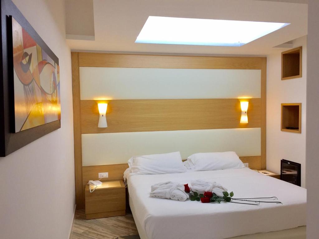 Postel nebo postele na pokoji v ubytování Hotel Sant'Elia