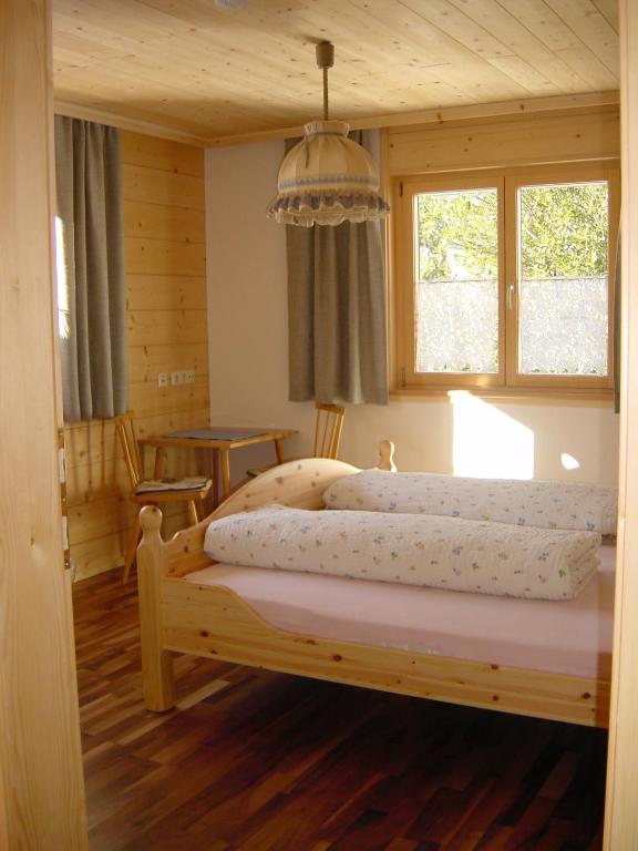 Postel nebo postele na pokoji v ubytování Chalet Montafon
