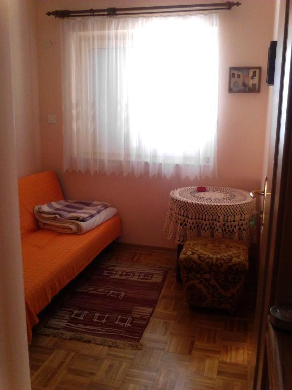 Postel nebo postele na pokoji v ubytování Apartments Brčić