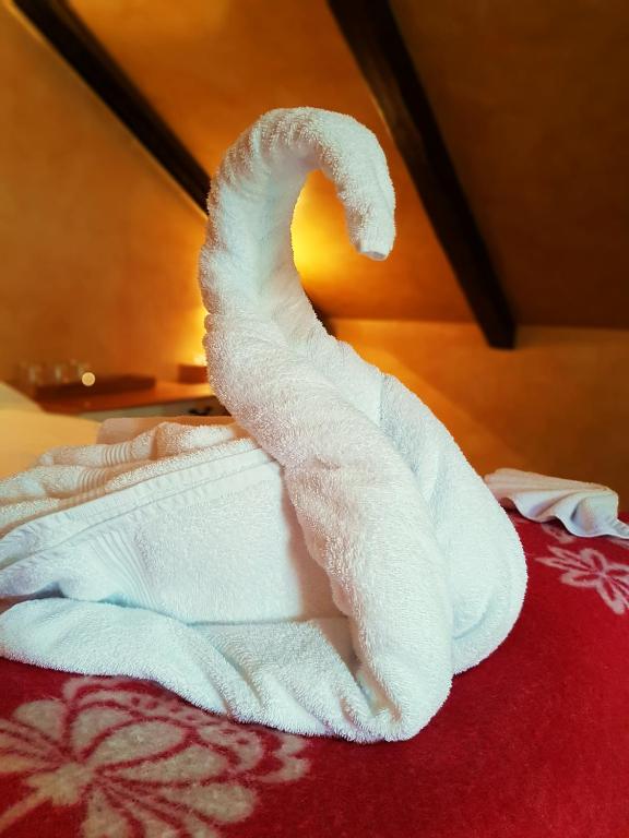 Postel nebo postele na pokoji v ubytování Hótel Tindastóll