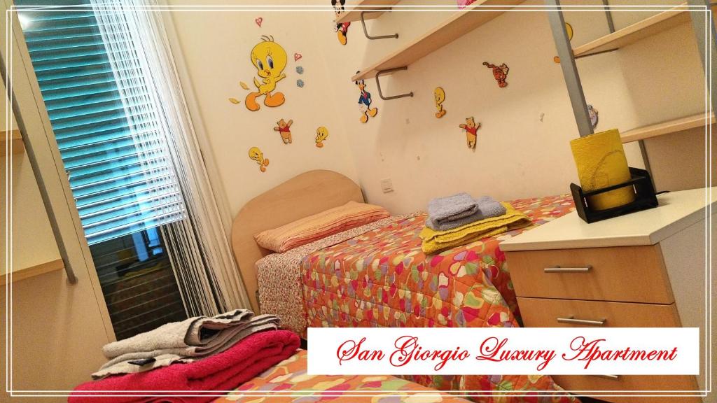 Posteľ alebo postele v izbe v ubytovaní San Giorgio Luxury Apartment Taormina-Panoramic Pool & Parking Space