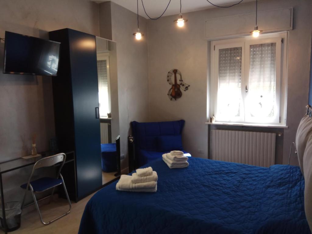 Postel nebo postele na pokoji v ubytování B&B SanRock