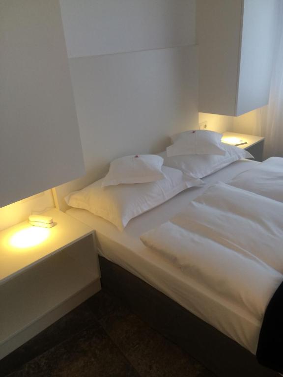 Postel nebo postele na pokoji v ubytování Hotel Lindenhof