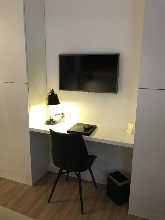TV a/nebo společenská místnost v ubytování Hotel Lindenhof