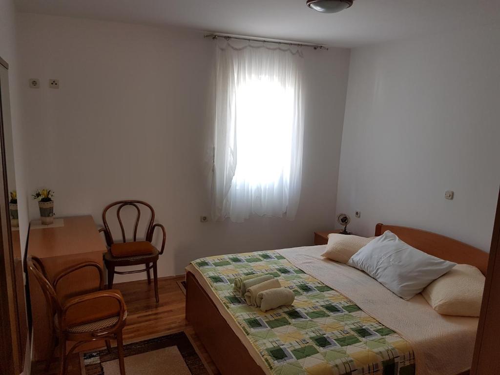 Postel nebo postele na pokoji v ubytování Holiday Home Granić