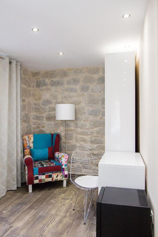 Posezení v ubytování Elegant Residence Rooms & Apartments