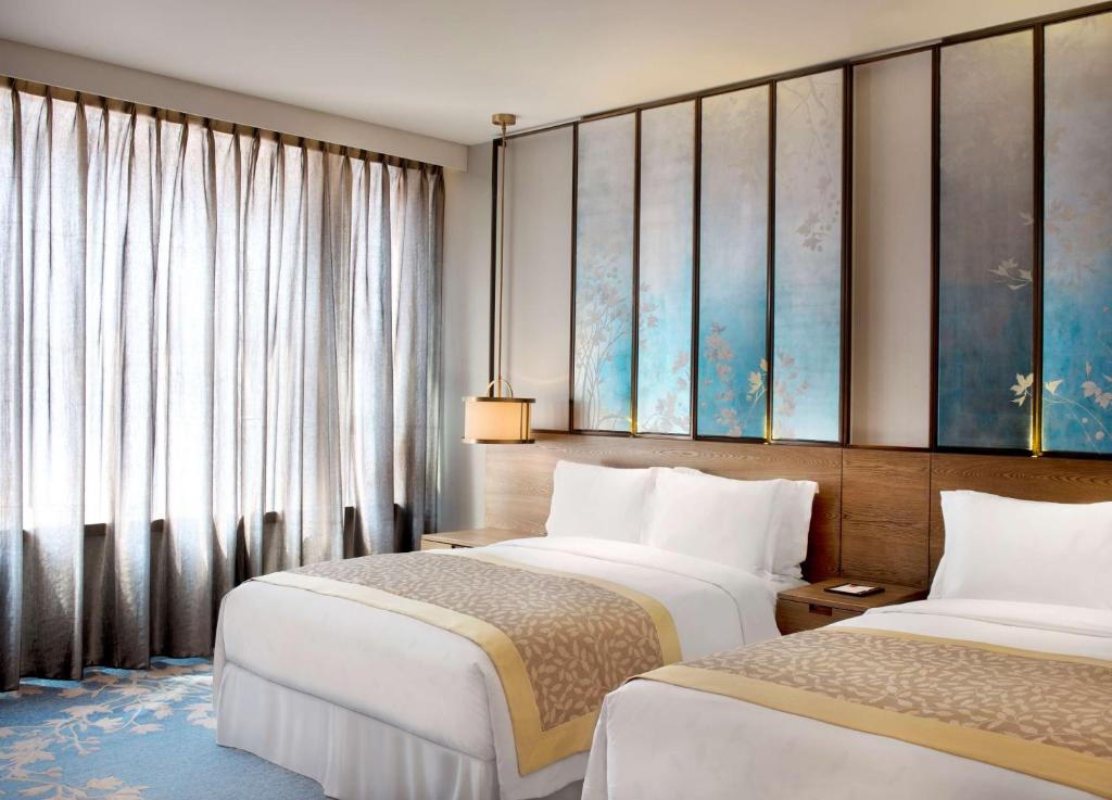 HUALUXE Shanghai Twelve At Hengshan, an IHG Hotel - Premium Queen Room Met Twee Queensize Bedden