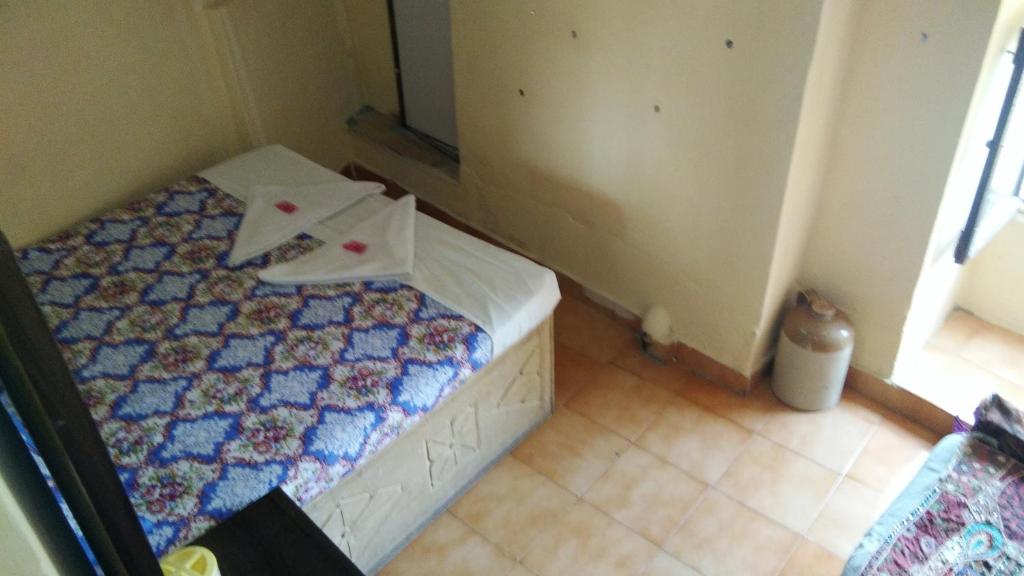 Postel nebo postele na pokoji v ubytování Hotel Desert