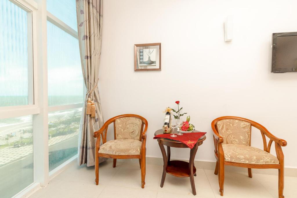 TV a/nebo společenská místnost v ubytování Romeliess Hotel
