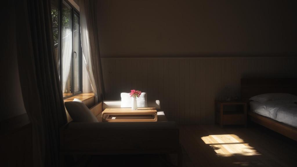 Postel nebo postele na pokoji v ubytování Zen Box House