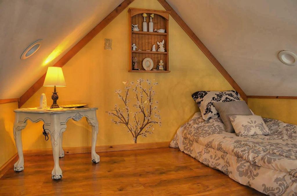 Letto o letti in una camera di Rarumpelpunzeldornaschenwittchen