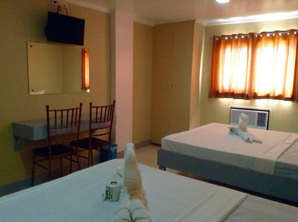 Postel nebo postele na pokoji v ubytování UKL Ever Resort Hotel