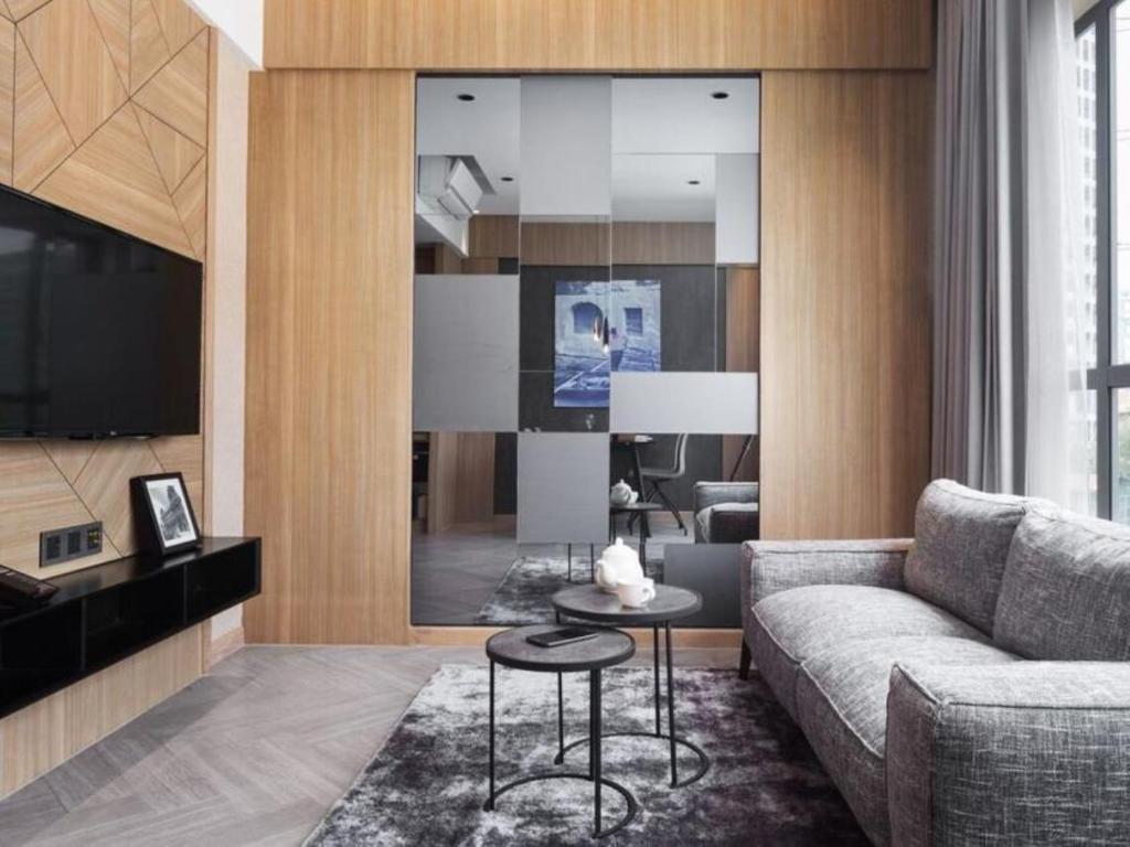 TV a/nebo společenská místnost v ubytování One Residence Hotel & Apartment