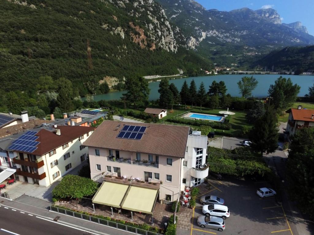 an aerial view of a house with solar panels on the roof at Albergo Miralaghi in Padergnone