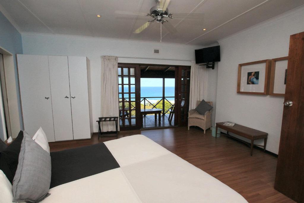 Postel nebo postele na pokoji v ubytování Wailana lodge