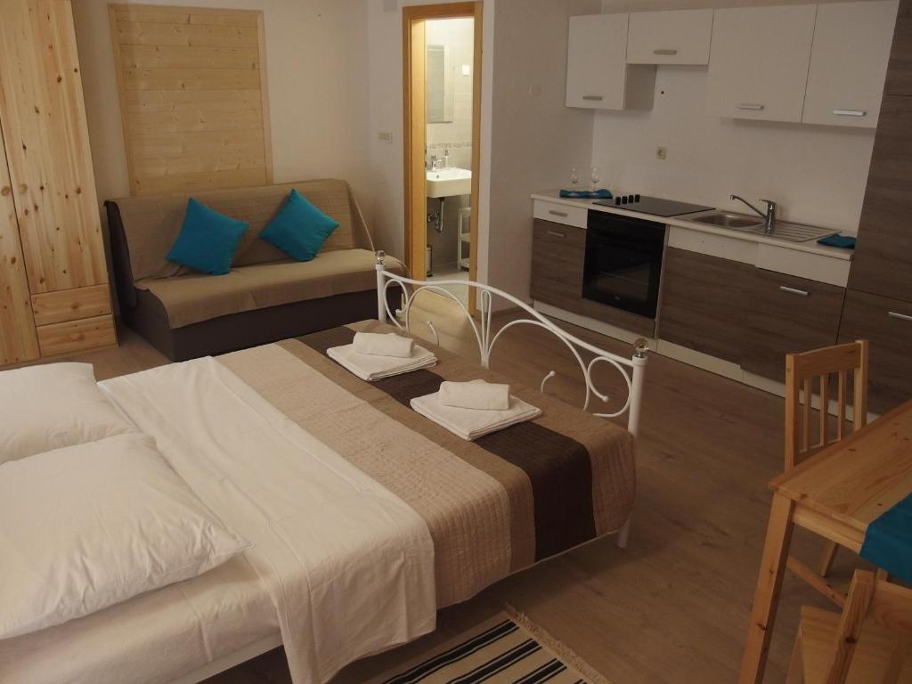 Posteľ alebo postele v izbe v ubytovaní Guesthouse Casetta Verde