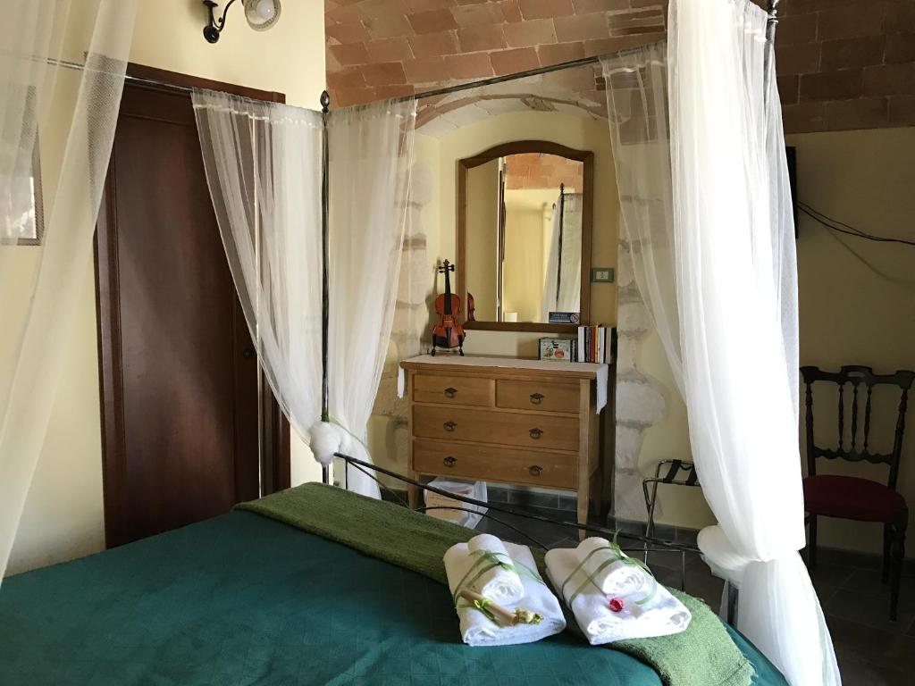 En eller flere senger på et rom på B&B Casa Mila'