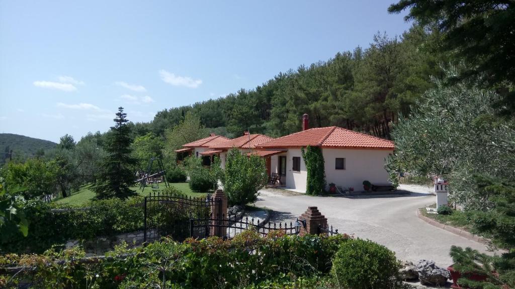 a house in the mountains with a driveway at Nefeles Tou Nestou in Toxotes Xanthis