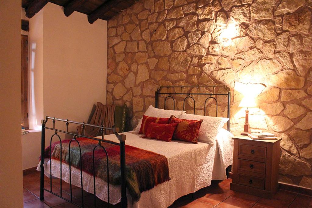 Postel nebo postele na pokoji v ubytování Casa Rural Majico
