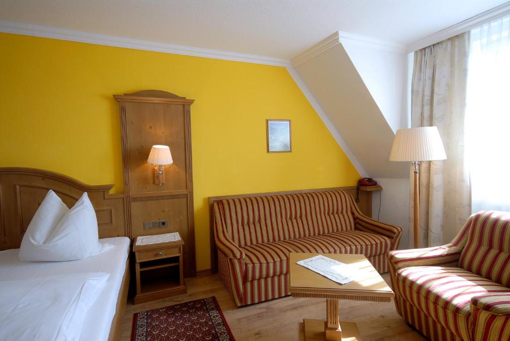 Postel nebo postele na pokoji v ubytování Hotel Gondel