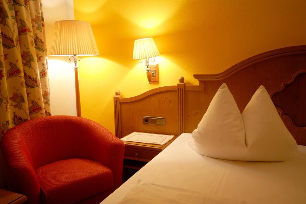 Postel nebo postele na pokoji v ubytování Hotel Gondel