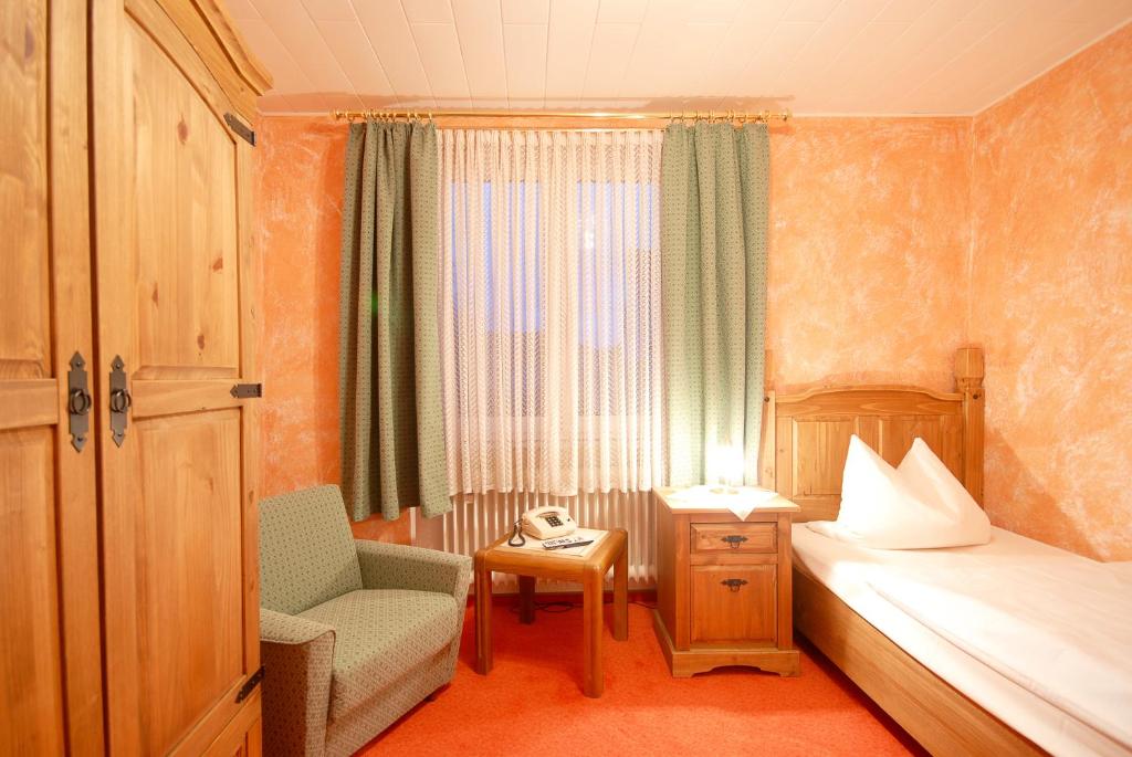 Postel nebo postele na pokoji v ubytování Hotel Gondel