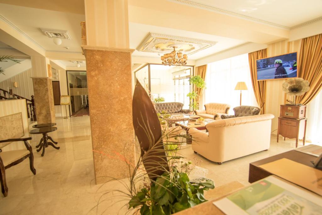 TV a/nebo společenská místnost v ubytování MSR Port Hotel