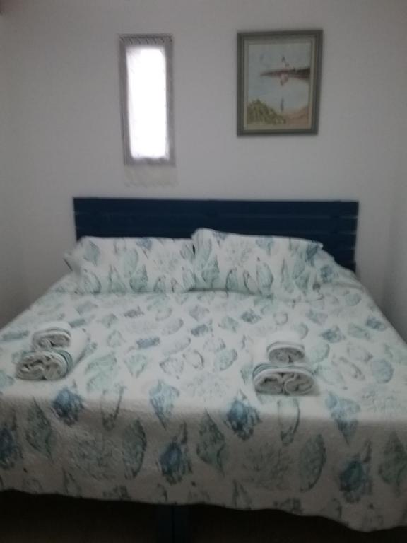 Postel nebo postele na pokoji v ubytování Mouria Hotel