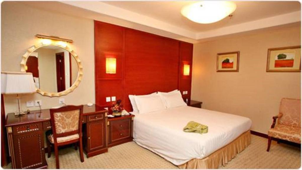 Postel nebo postele na pokoji v ubytování Hotel Swan Inn