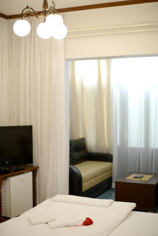 Una cama o camas en una habitación de Hotel Sanja former Oliva