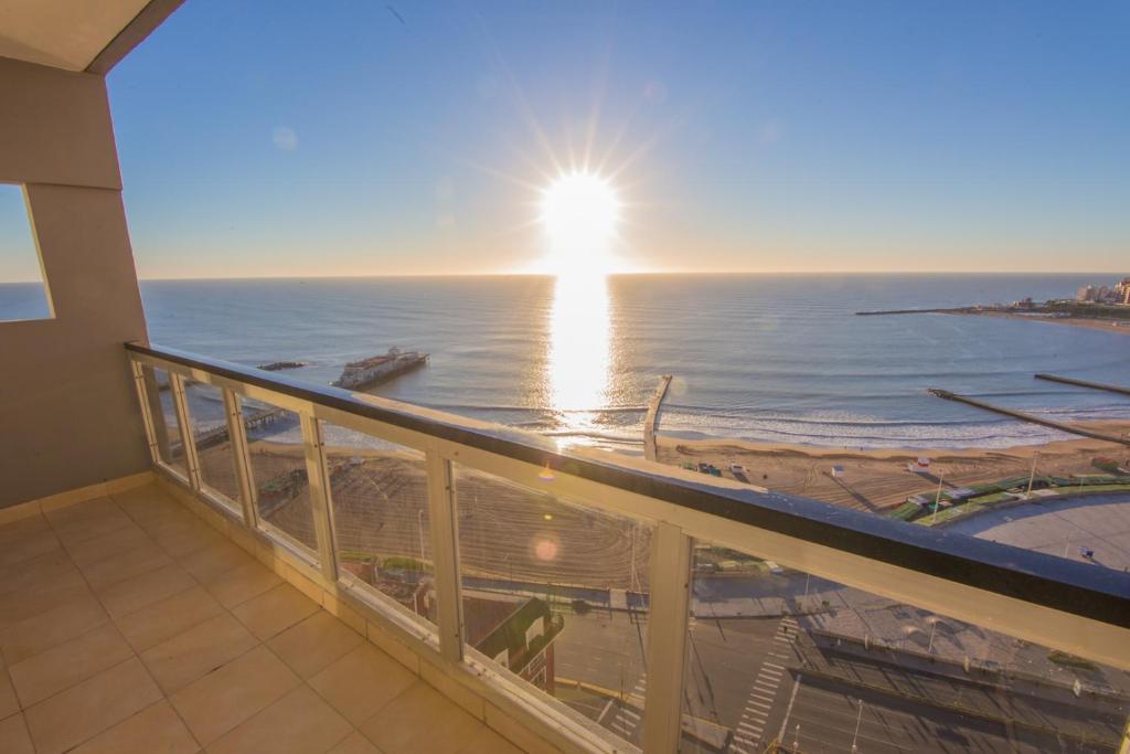 a view of the ocean from the balcony of a condo at Bristol Condominio Apart Hotel in Mar del Plata