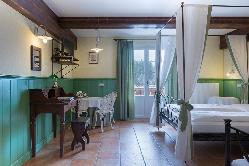 Letto o letti in una camera di Quinz - Locanda Al Lago