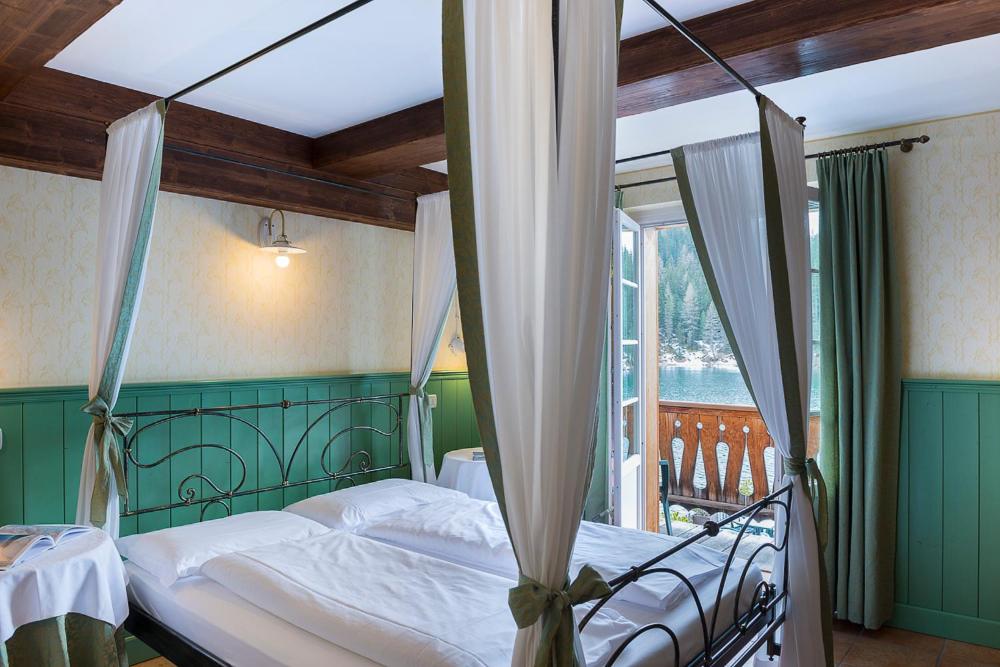 Letto o letti in una camera di Quinz - Locanda Al Lago