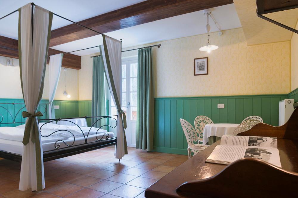 Letto o letti in una camera di Quinz - Locanda Al Lago