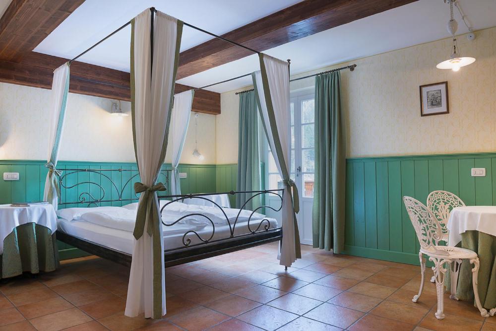 Letto o letti in una camera di Quinz - Locanda Al Lago