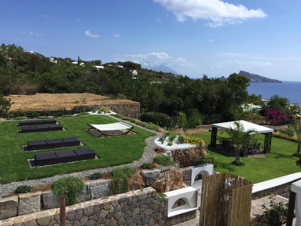 an aerial view of a garden with the ocean in the background at B&B da Luca in Panarea