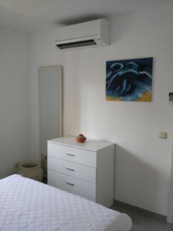 Posteľ alebo postele v izbe v ubytovaní Precioso Apartamento Frente Al Mar