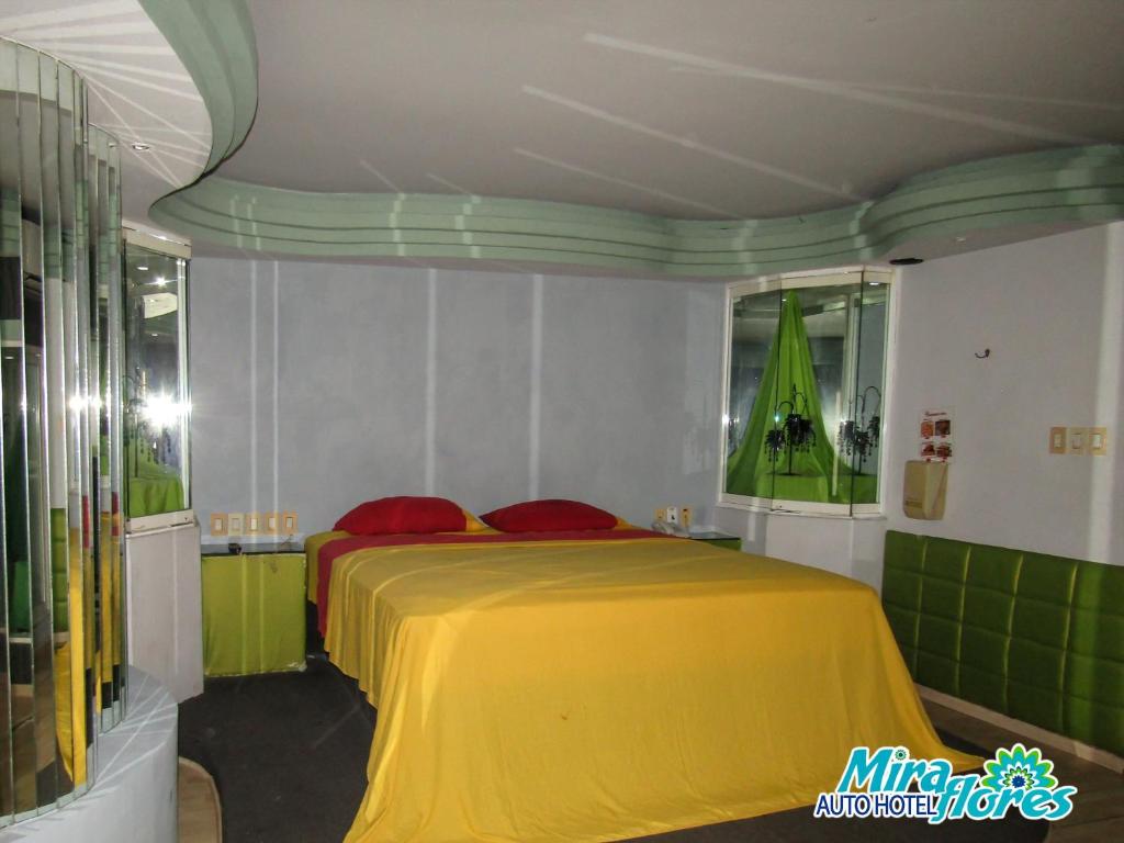 Postel nebo postele na pokoji v ubytování Autohotel Miraflores