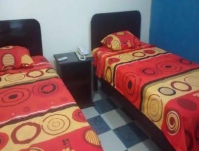 Postel nebo postele na pokoji v ubytování Hotel Marina Campeche