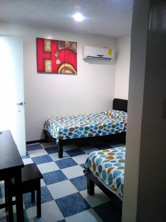 Postel nebo postele na pokoji v ubytování Hotel Marina Campeche