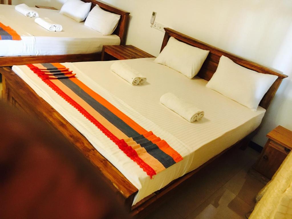 Postel nebo postele na pokoji v ubytování AliKele Hotel & Resort