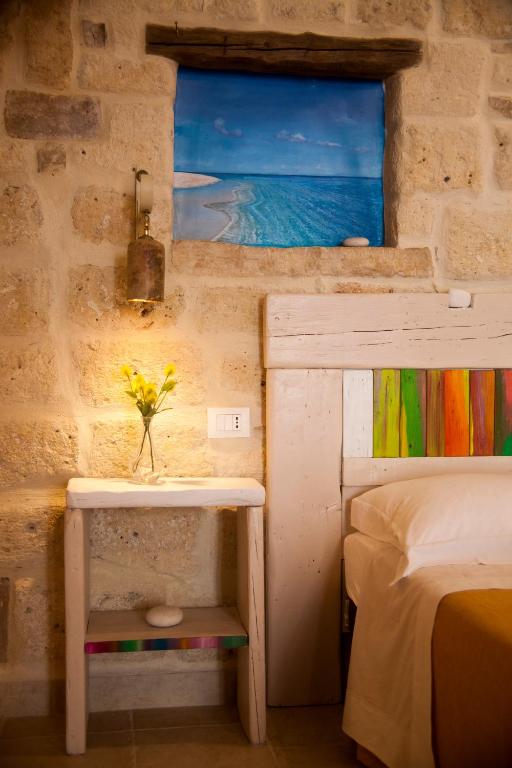 Postel nebo postele na pokoji v ubytování 3 Archi B&B